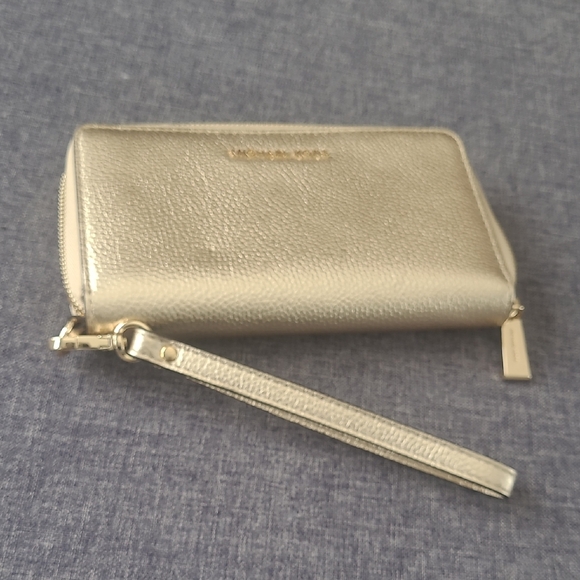 Michael Kors Handbags - Michael Kors Metallic Gold Zip Wristlet